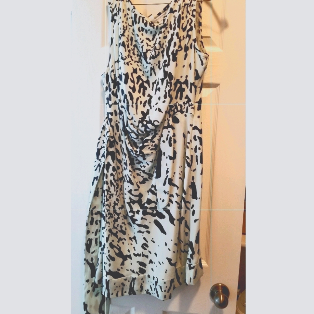 DIANE von FURSTENBERG 100% Silk Dress. Pale green/ blue w/ black pattern.